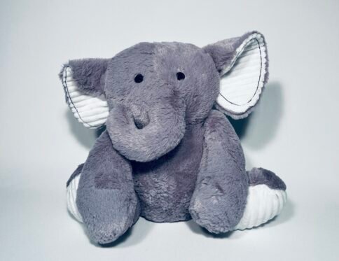Plush grey weighted elephant teddy bear with white ribbed ears and feet, sitting on a white background, designed for deep pressure sensory input for children with autism or ADHD.