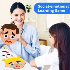 img_1930 Occupational therapist or parent guiding a child using Emotion Felt Faces. The adult holds a brown felt face showing sadness, while a blonde felt face showing crying is on the table, illustrating a social-emotional learning game.