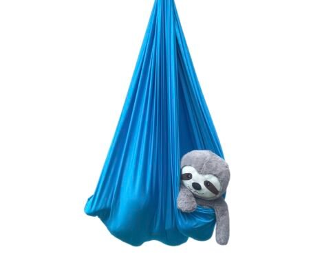 Blue lycra sensory swing with sloth toy tucked inside